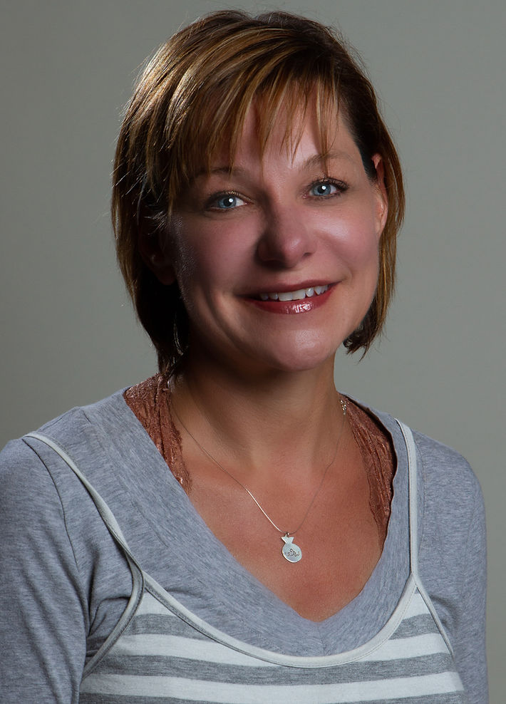 Headshot of Aquadale Veterinarian Dr. Kim Takacs